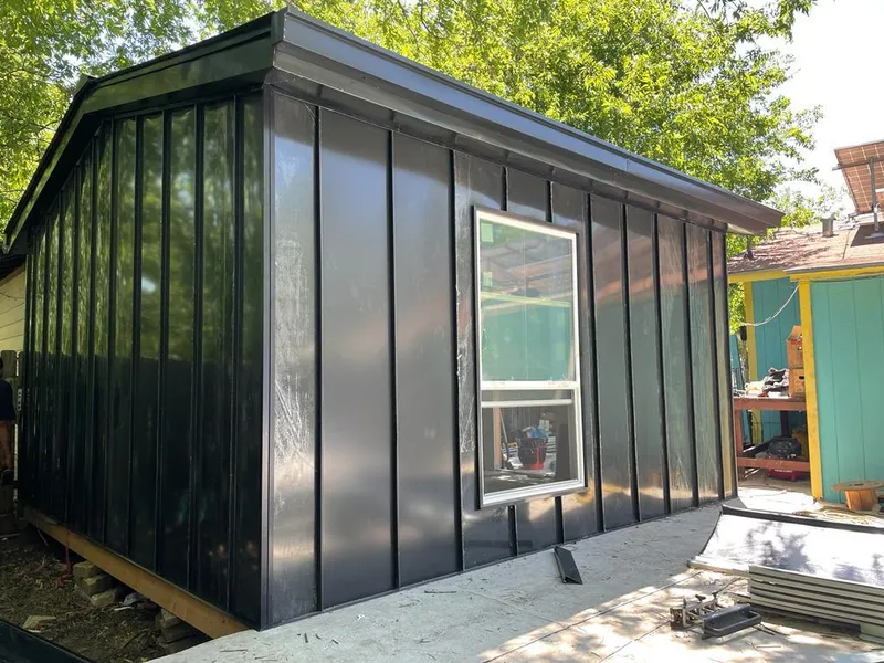 Black standing seam metal wall panels for Roof Inspection in Verona